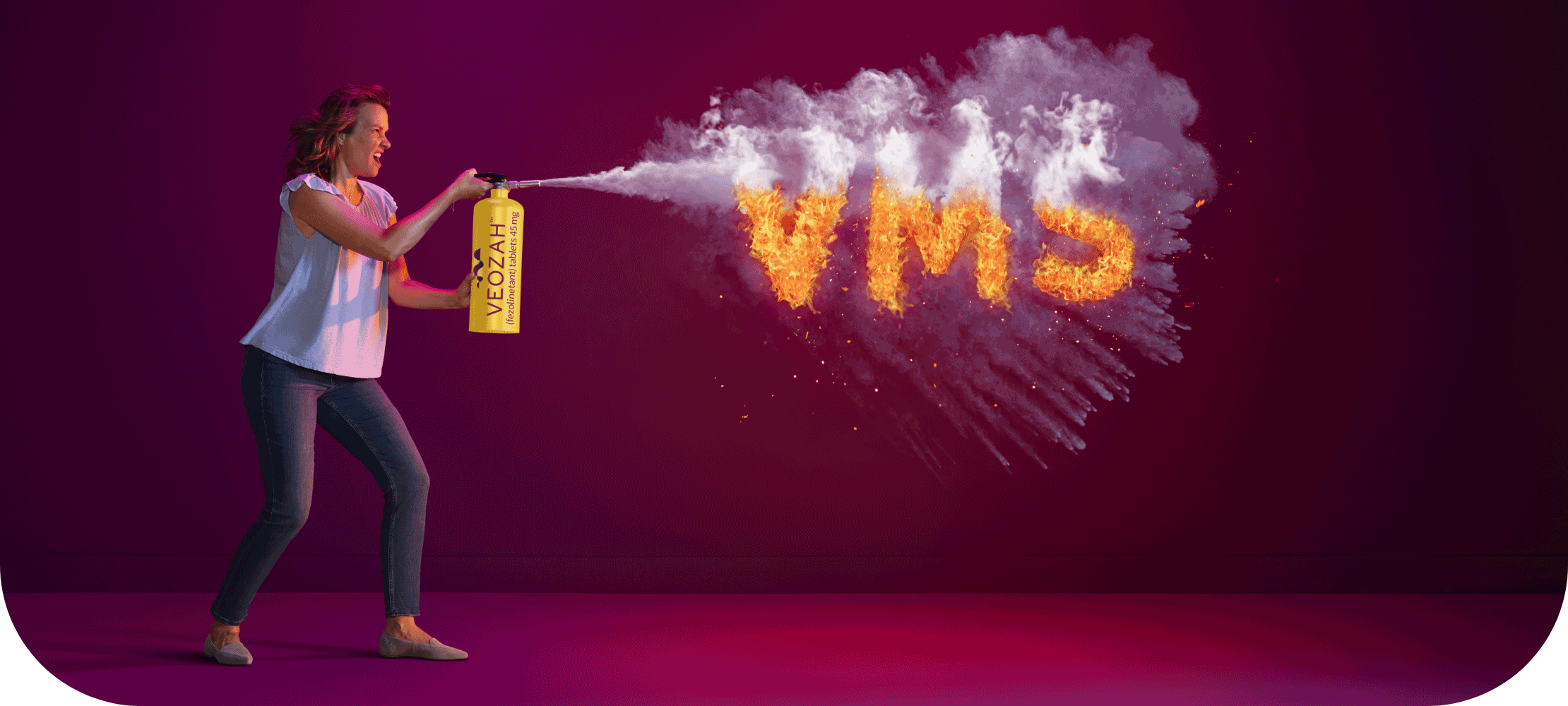 Woman spraying VEOZAH™ (fezolinetant) logo fire extinguisher at VMS fire